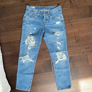 Levi’s 501 mid rise distressed jeans